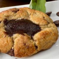 Brownie Stuffed Chocolate Chip Cookie · made famous at our pizzeria, now available here!