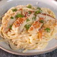 Linguine Chicken Alfredo · With cream sauce, chicken breast, a touch of Parmesan and savory spices.