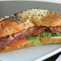 Red Hill Roast Beef · Thinly sliced roast beef, horseradish/garlic cream cheese, lettuce, tomatoes, red onions on ...
