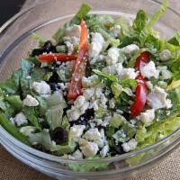 The Greek Theatre · Shredded iceberg lettuce, black olives, feta cheese, green peppers, red peppers, cucumbers, ...