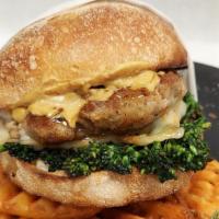 Porky Pig · Perfectly cooked Italian sausage, delicious sautéed collard chard and warm melted fontina ch...