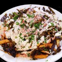 Loaded Shawarma Fries · With your choice of meat. Chicken or beef.