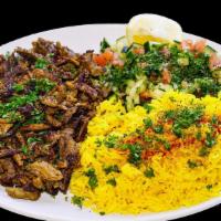 Beef & Lamb Shawarma Plate · Served with rice and salad.