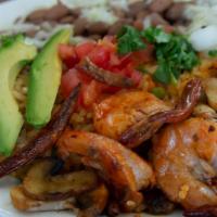 Prawn Dinner · With rice, beans, salad, guacamole, sour cream and tortillas.