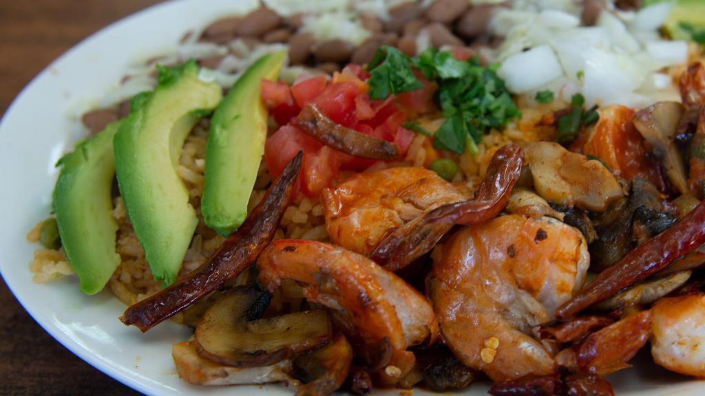 Prawn Dinner · With rice, beans, salad, guacamole, sour cream and tortillas.