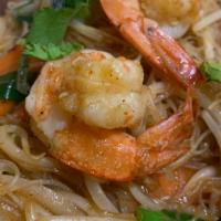 90. Singapore Noodles · Hot. Spicy rice noodles stir-fry with chicken or shrimps, carrots, red bell pepper and chili.