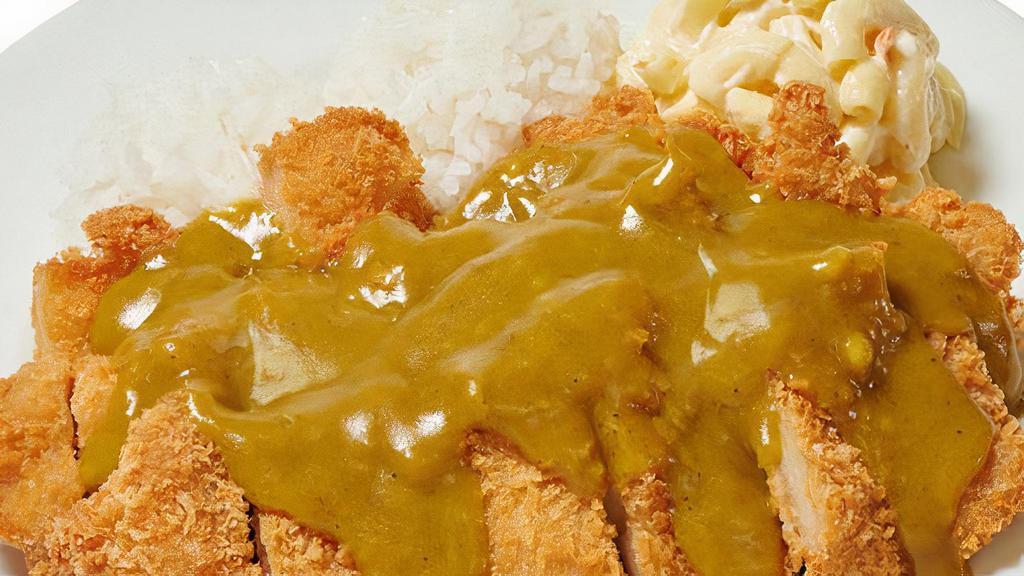 Katsu Curry · Golden crispy breaded chicken topped with yellow curry.
