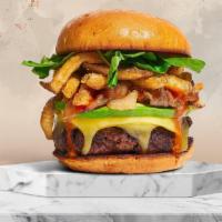 Everything In One Burger · Your choice of tofu or impossible patty topped with fries, avocado, and caramelized onions. ...