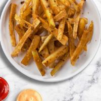 Savory Sweet Potato Fries · (Vegetarian) Thick-cut sweet potato wedges fried until golden brown