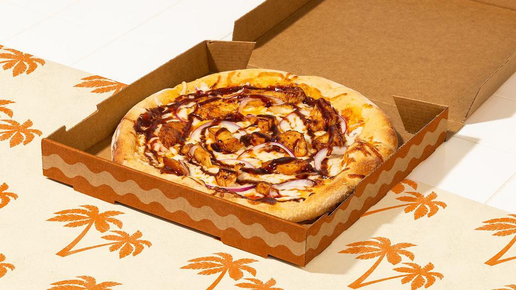 Bbq Chicken Pizza · BBQ chicken, BBQ sauce, and red onion with tomato sauce and fresh mozzarella.
