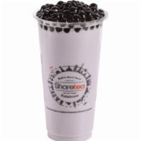 Taro Pearl Milk Tea · This drink comes with boba.
