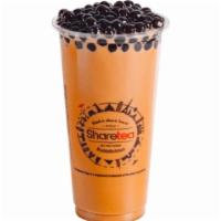 Thai Pearl Milk Tea · This drink comes with boba.