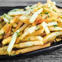 Truffle Fries · Golden fries drizzled with truffle oil.