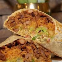 Breakfast Burrito · SCRAMBLED EGGS WITH CHORIZO SERVED WITH
SWEET POTATOES FRIES