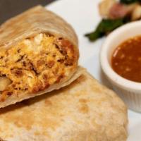 Burrito · Choice of carnitas grilled steak al pastor grilled chicken or mixed vegetables rice beans pi...