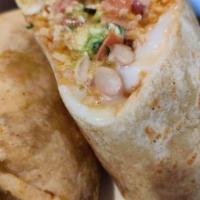 Burrito de Fajitas · Your choice of chicken steak or shrimp.