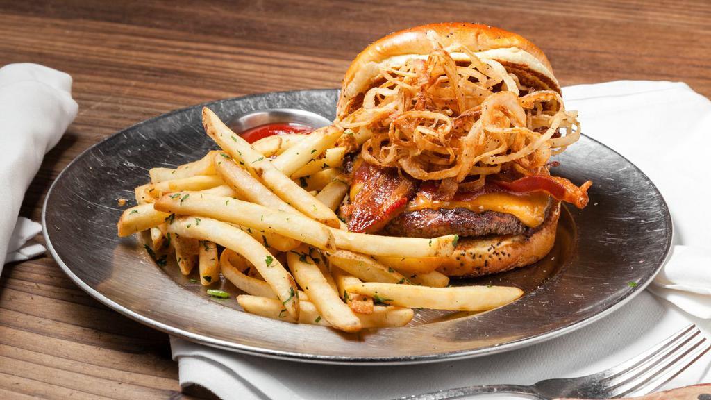 Cowboy Burger · Shoestring onions, bacon, Cheddar, and beer barbeque sauce.