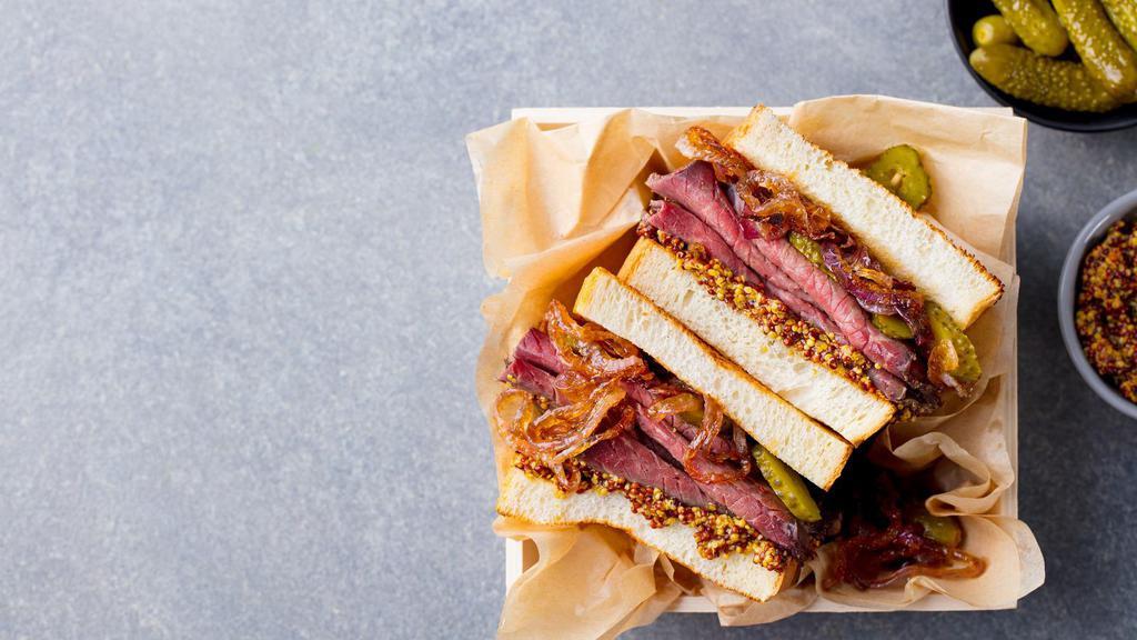 Cold Pastrami Sandwich · Juicy pastrami, jalapeños, pickled peppers, tomato, onions, lettuce, mayo & mustard.