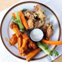Thirteen Wings · All of the wings: served the traditional way with celery and carrot sticks and a choice of b...