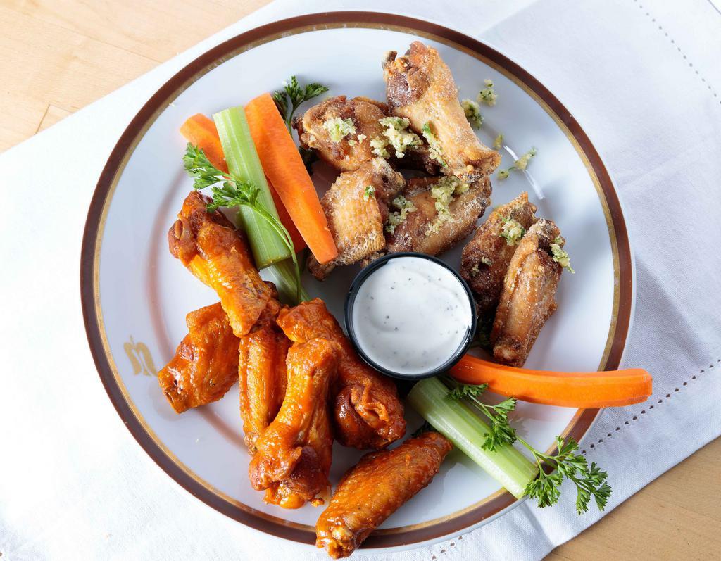 Thirteen Wings · All of the wings: served the traditional way with celery and carrot sticks and a choice of bleu cheese or ranch.
