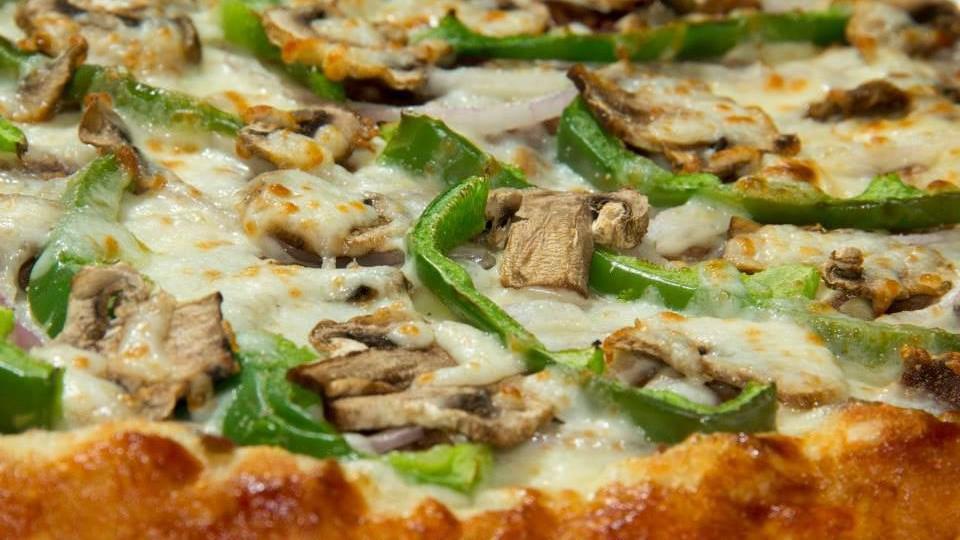 Small Philly Cheesesteak · 12 Inch philly cheesesteak pizza- american cheese,philly steak, onions, mushrooms, green pepper and provolone cheese.