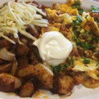 Chorizo scrambled  · Chorizo with scrambled eggs, jack cheese, served with beans, potato, sour cream and tortillas