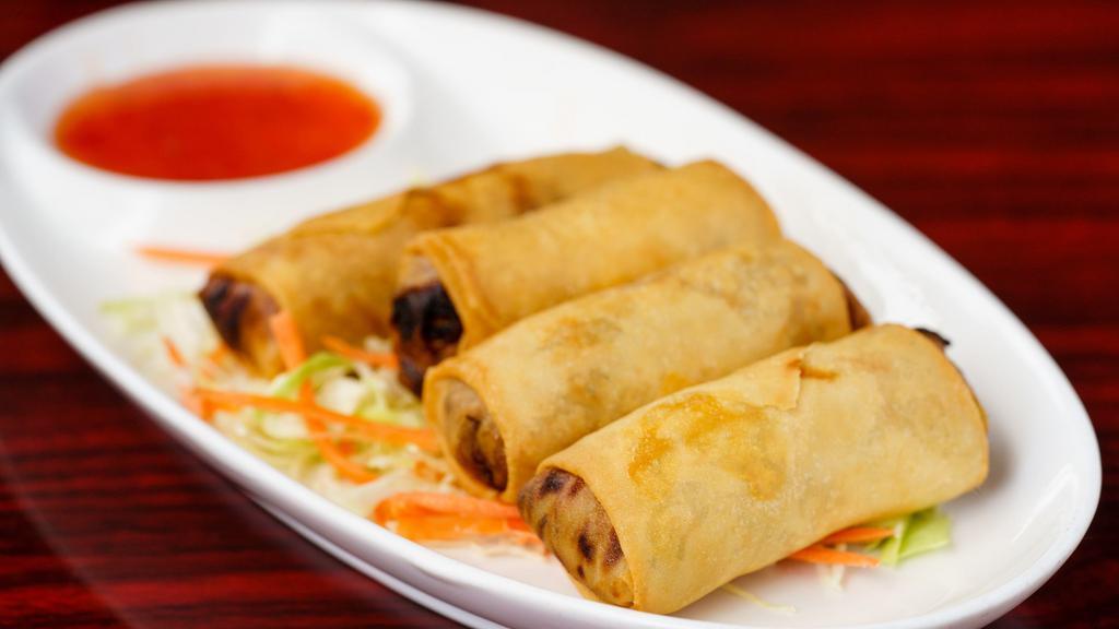 2. Por-Pier Pak (Vegetarian Egg Rolls) (4 Pc) · Deep fried egg rolls stuffed with silver noodle and vegetables served with sweet and sour sauce.