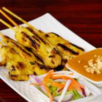 9. Chicken Sa Tae (5 Pc) · Grilled chicken shewers marinated in herbs, spices, and yellow curry served with peanut sauc...