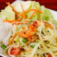 15. Som Tum Goong Yang · Hot. Shredded green papaya salad with grilled shrimp, chili and cherry tomatoes tossed in a ...