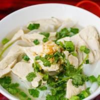 50. Chicken Noodle Soup · Chicken noodle soup served with sliced chicken and bean sprouts.