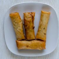 Egg Rolls (4) · Crispy egg rolls filled with mixed vegetables, served with sweet & sour sauce.