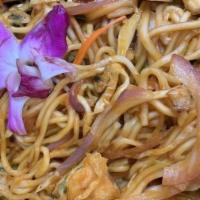 Chicken Chow-Mein · Stir-fried noodles cooked with grilled chicken and vegetables on spices. Served with tomato ...
