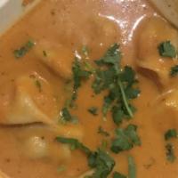 Chicken Jhol Momo · Chicken momo served with rich flavored broth on Himalayan spices.