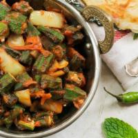 Bhindi Masala · Vegan, gluten free. Cut okra cooked with tomato and onion gravy.