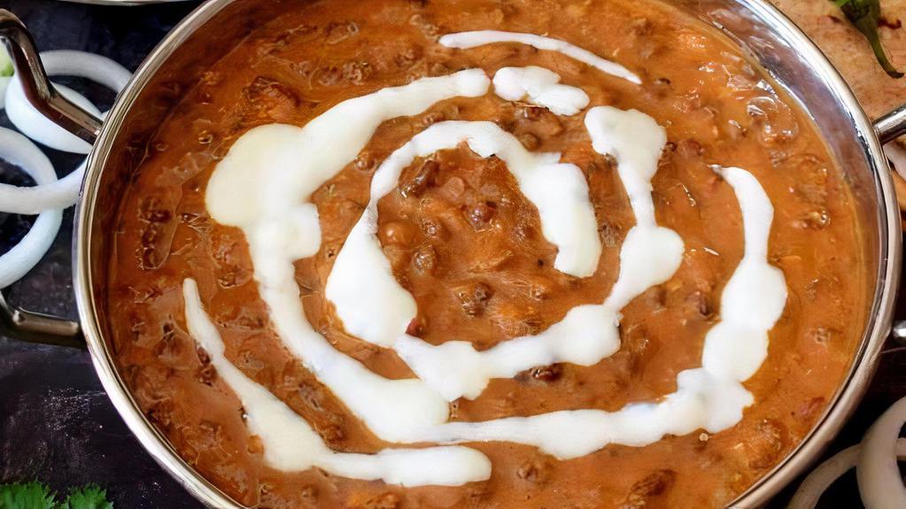 Dal Makhani · Mixed lentils cooked with cumin and creamy sauce and garnished with corriander.