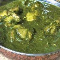 Chicken Saag · Boneless chicken and finely chopped spinach cooked with homemade spices in onion and tomato ...