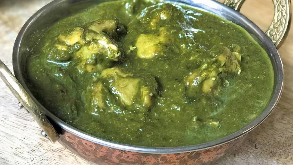 Chicken Saag · Boneless chicken and finely chopped spinach cooked with homemade spices in onion and tomato gravy.