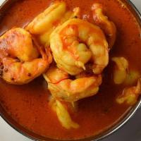 Shrimp Curry · Shrimp cooked with Indian spices on onion-tomato gravy sauce.