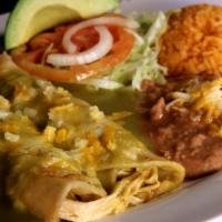 Enchilada Special · 10 Enchiladas with chicken, pork or potato served with Mexican rice, Refried pinto beans.