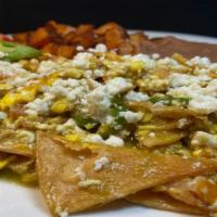 Chilaquiles Plate · Fried tortilla strips, 2 scrambled eggs, serranos, onions, tomatoes, tomatillo sauce and mex...