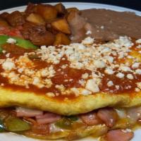 Omelet a la Mexicana Plate · 3 eggs, sautéed veggies and 2 types of cheese, with breakfast meat, served with refried bean...