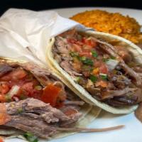Regular Taco Platter · Meat of your choice 2  regular tacos (meat, beans & salsa)  in  corn tortillas with Mexican ...
