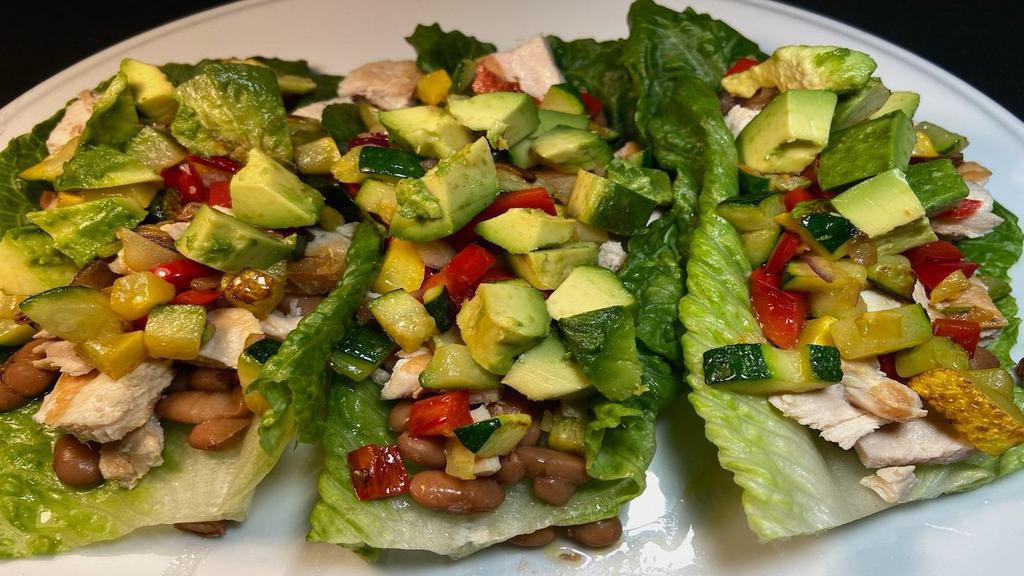 Lettuce Tacos · Three lettuce tacos, meat of your choice with whole pinto beans, veggies, and avocado