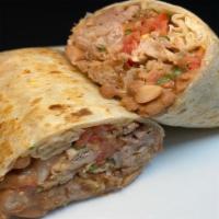 Regular Burrito · Meat of your choice in a flour tortilla with  beans and salsa fresca.