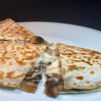 Mushroom Flour Quesadilla · Grilled flour tortilla  with melted cheese & sauteed mushrooms. Ask for guacamole, salsa & s...