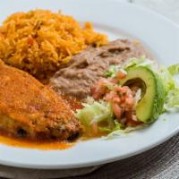 *Chile Relleno Plate · Fresh California pod  Filled with mexican cheese & salsa ranchera on top. Served with refrie...