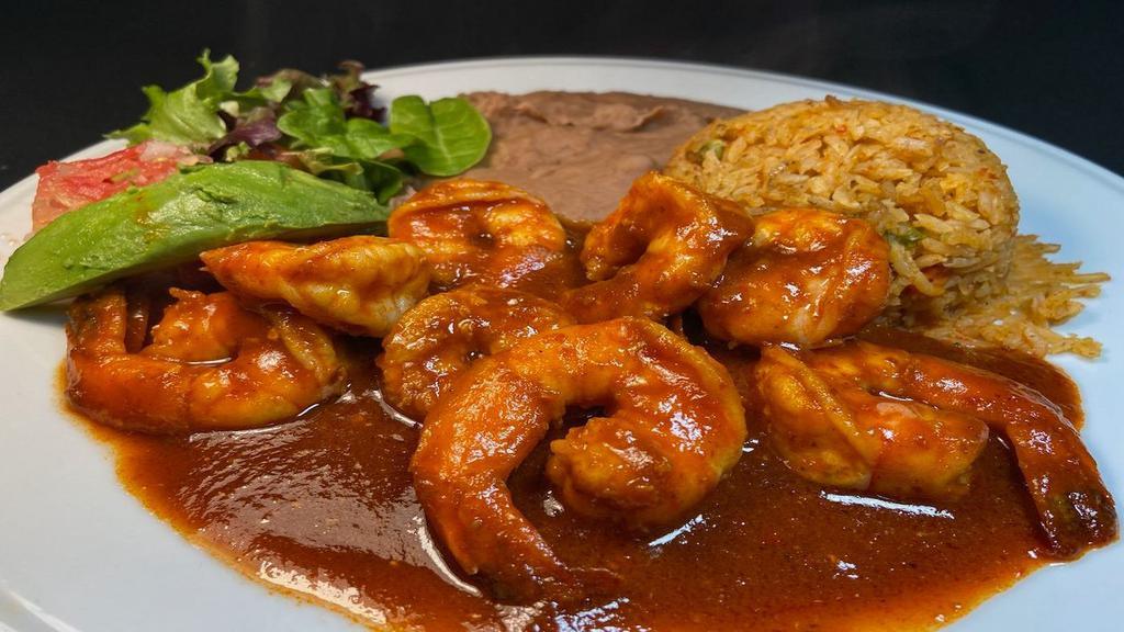 Camarones a la Diabla Plate · Large sauteed prawns in hot spicy sauce served with refried beans, Mexican rice, salad & avocado slice. Your choice of  4 corn or 3 flour tortillas.