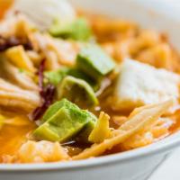 Tortilla Soup (no meat) · Fried pieces of corn tortilla in a chicken & tomato broth topped with avocado, mexican chees...