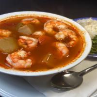 Caldo de Camarones · Large prawns soup with vegetables. Served with 4 corn or 3 flour tortillas.  On the side ric...