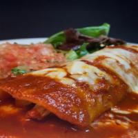 One Enchilada · A corn tortilla filled with chicken (or potato) and  your choice of enchilada sauce: green t...